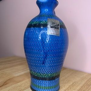 Textured blue/green container
